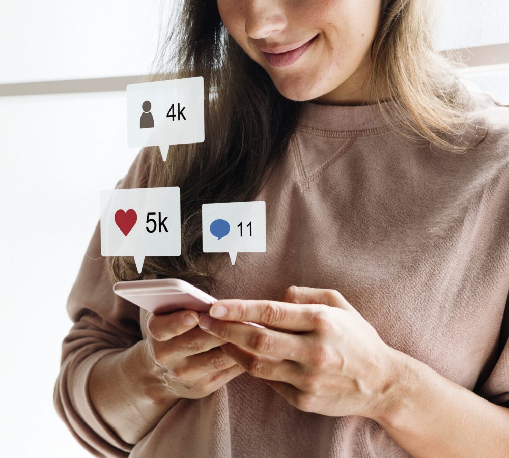 Woman using a smartphone social media conecpt